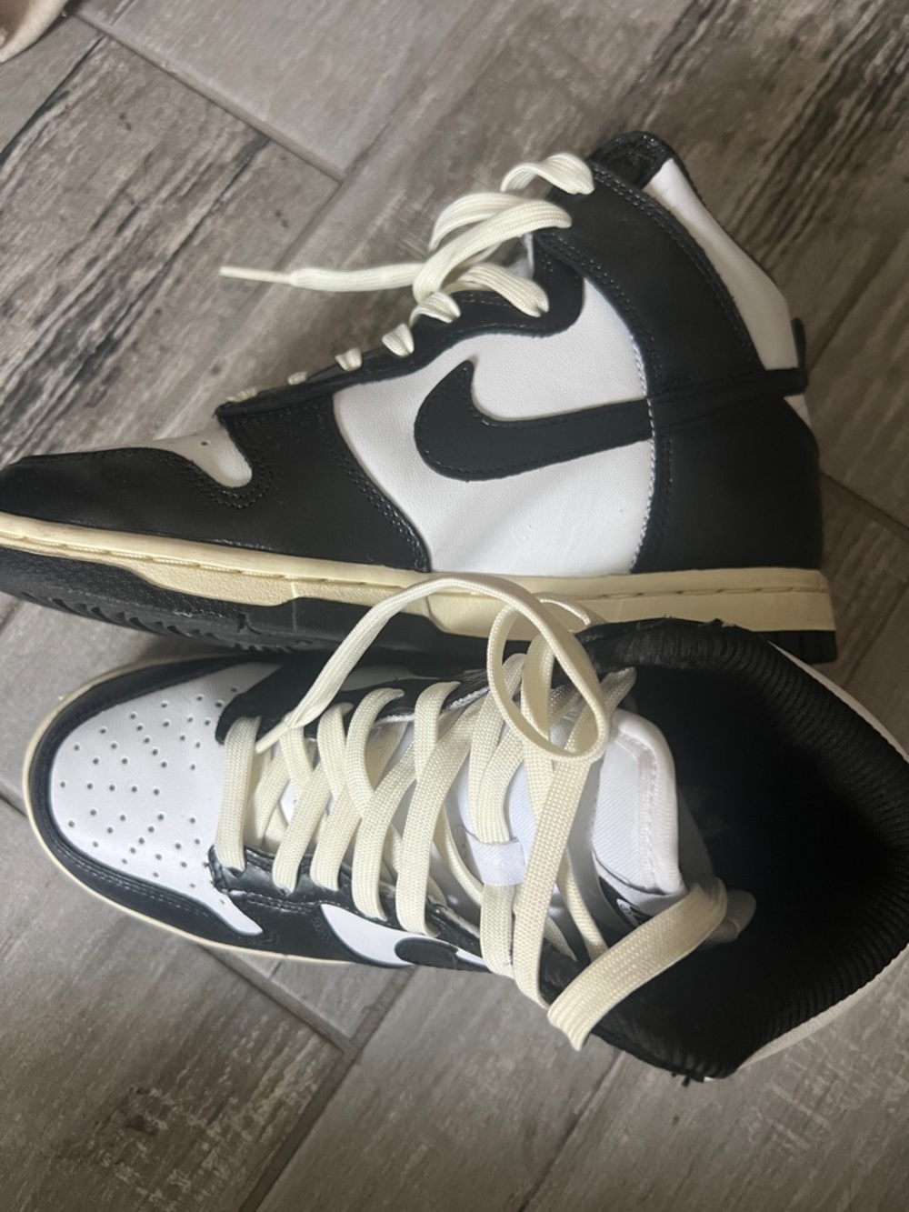 Nike Vintage Black and White High-Top Sneakers with Cream Accents